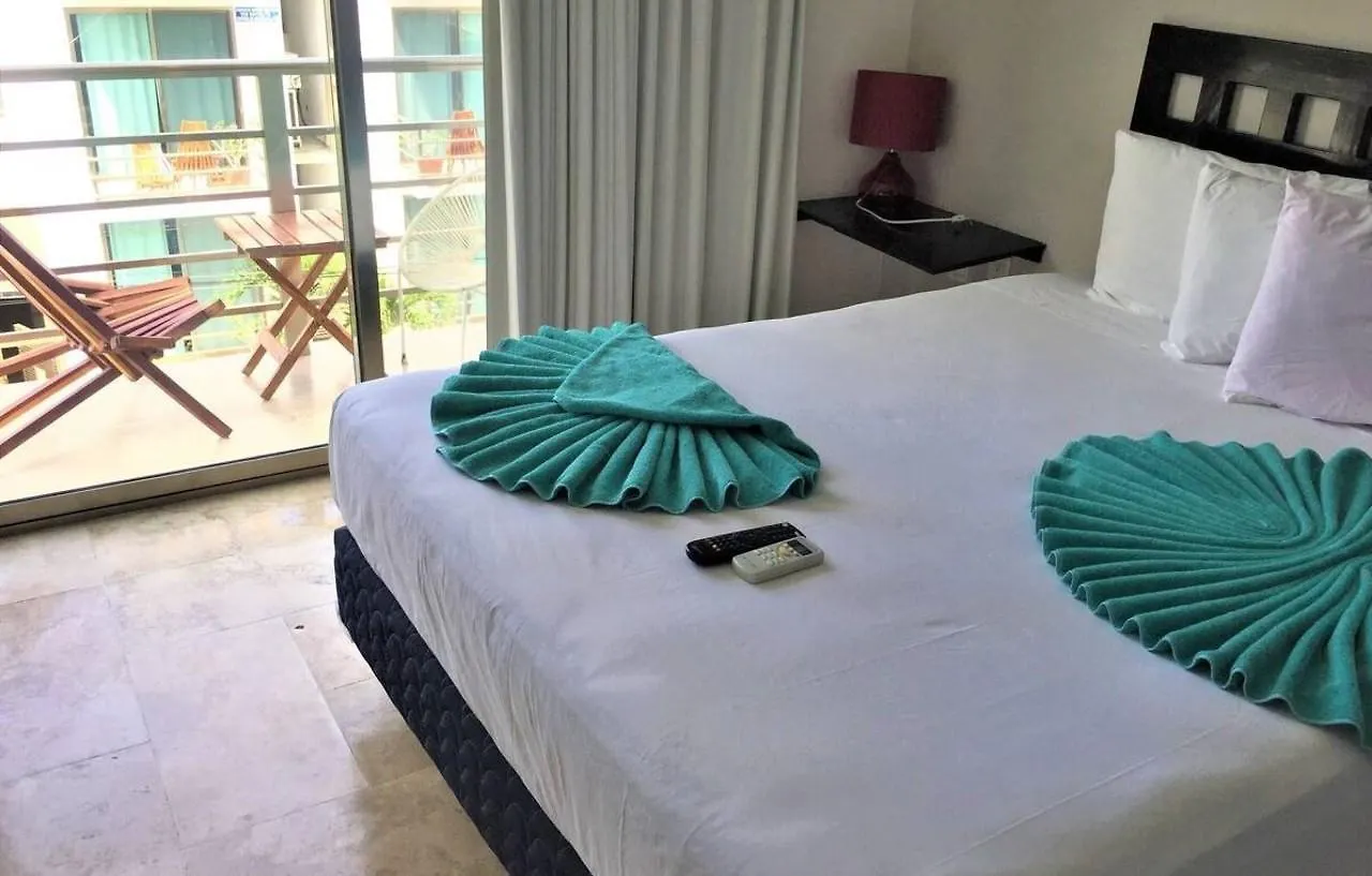 アパートホテル Coral Beach Condo プレヤデルカーメン